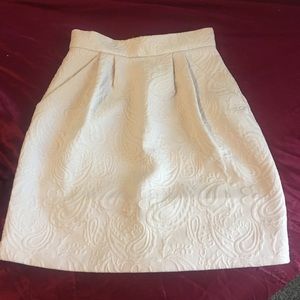 Cute white mid length skirt